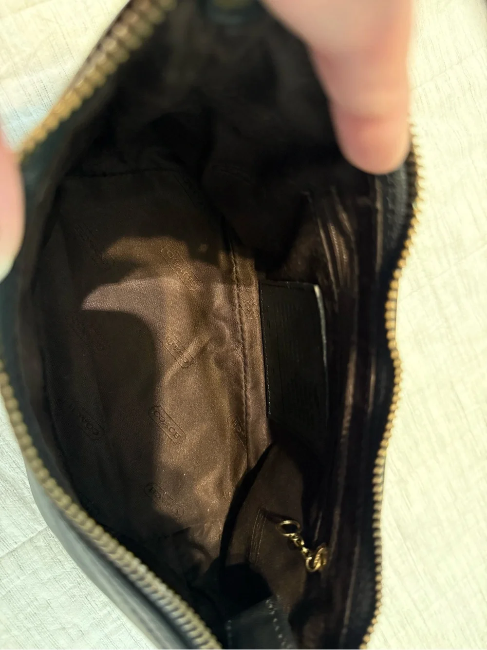 Coach sleek black